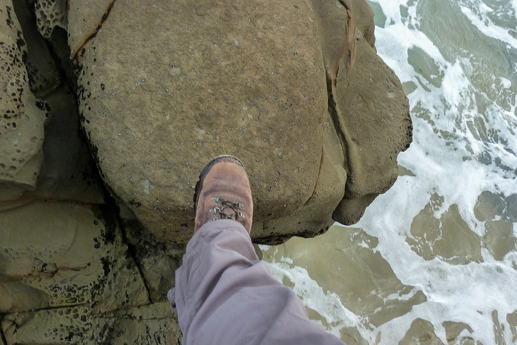 stepping-between-rocks-near-water