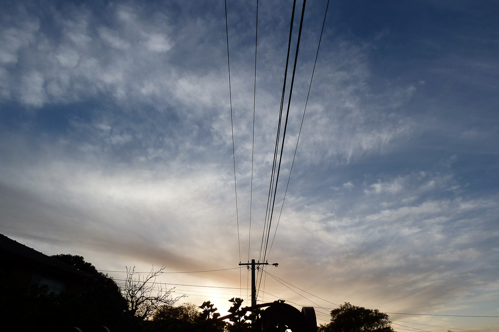 sunset-power-lines-suburbs