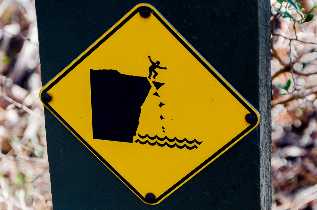 man-falling-danger-sign