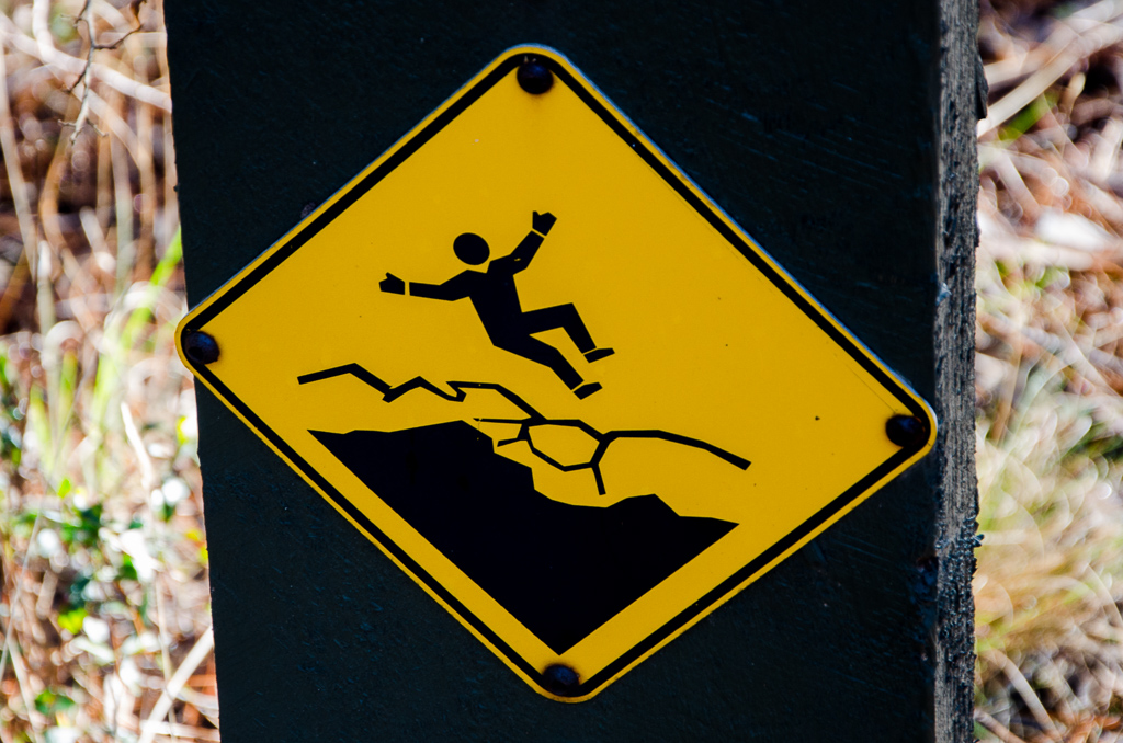 man-falling-danger-sign