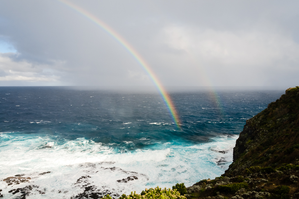 twin-rainbows-over-ocean