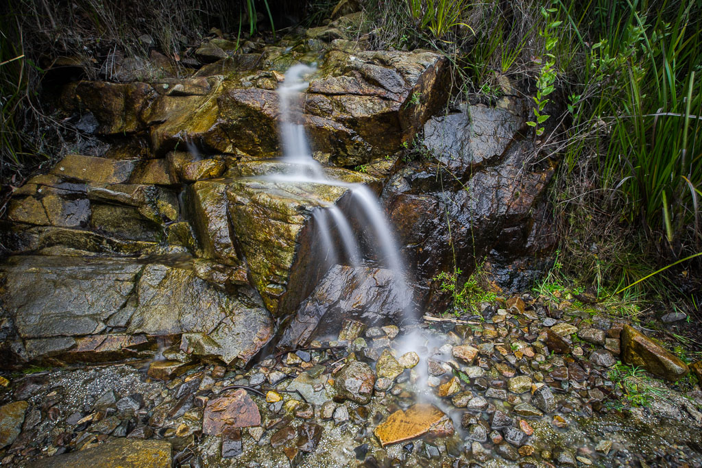 water-flowing-over-rocks