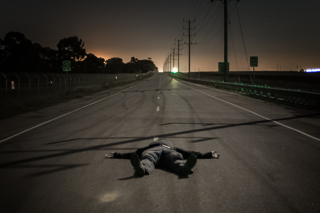 lying-on-road-night