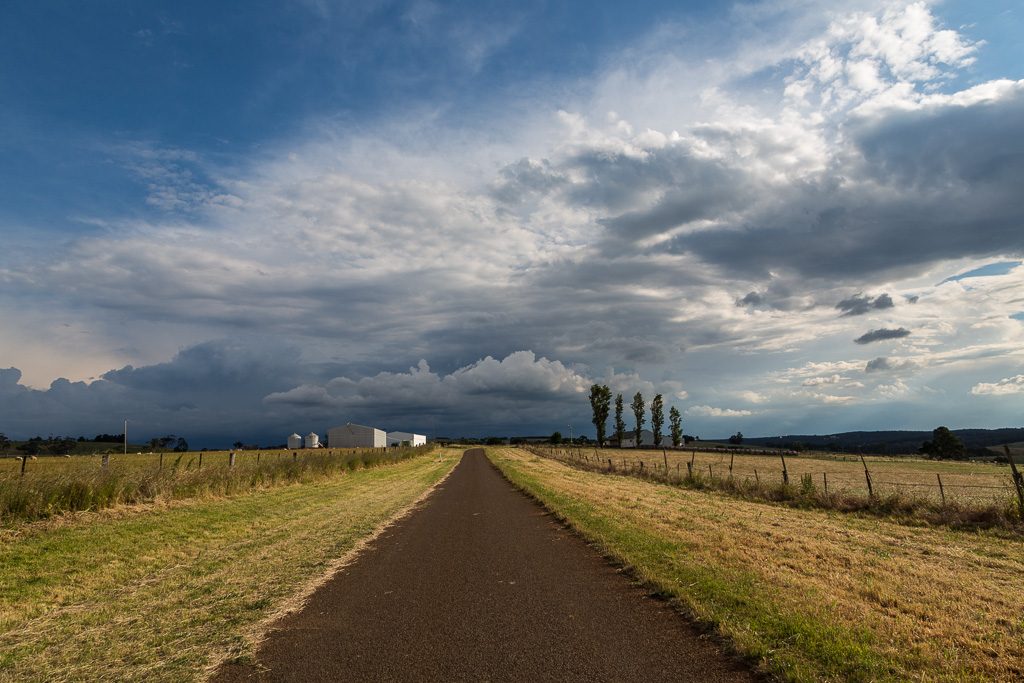 storm-clouds-over-road